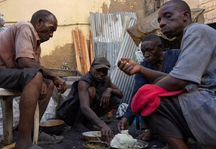 Construction workers do the same thing; they don’t need a table, the plastic that carries the takeaway pack will be their Floor mat.