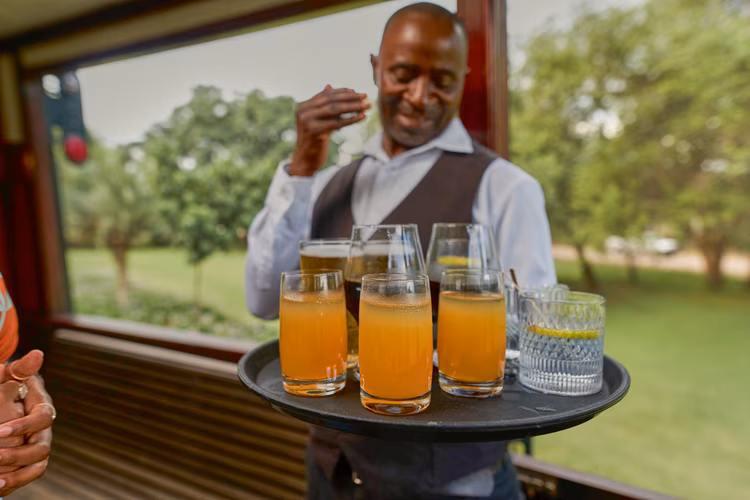 The wait staff are attentive while giving enough room to enjoy the courses. (Image by Chona Mweemba for Nkwazi Magazine).
