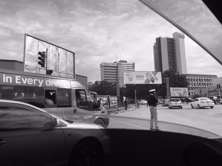Heavy traffic attracts officers, their eyes hunting fgor vehicles in the wrong. (Image by Eddie Musabula).