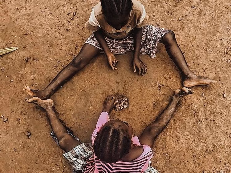 The movements looked simple from a distance, but every toss required timing and a steady hand. (Image courtesy of Mighty African History).