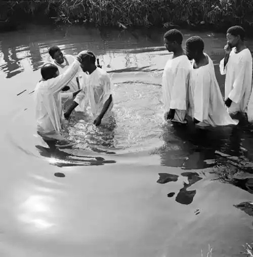 Image depicting baptism - not an actual image of Tomo Nyirenda.