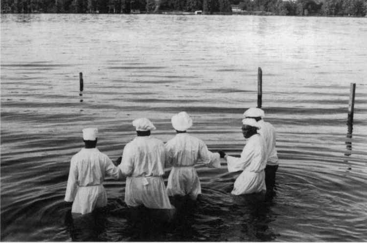 Image depicting baptism - not an actual image of Tomo Nyirenda.