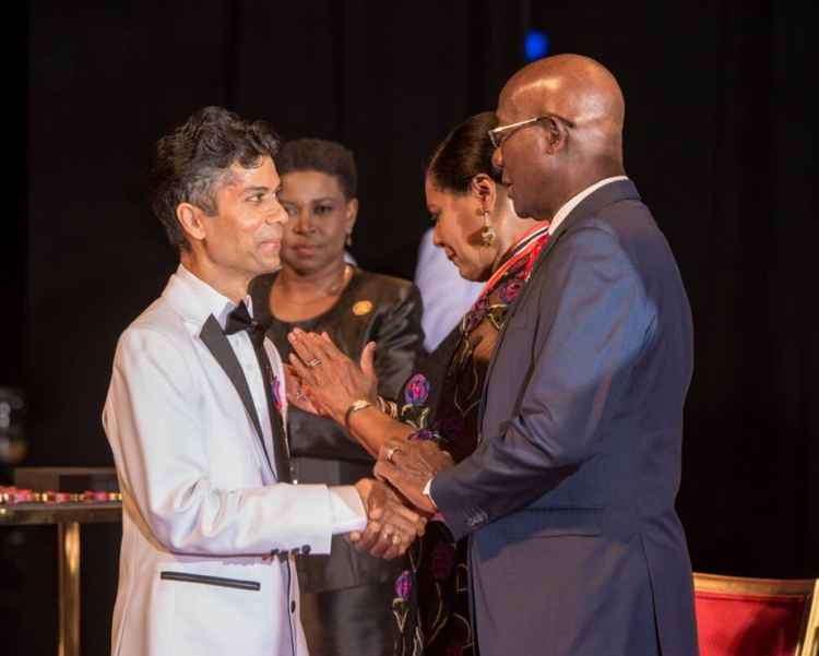 International Men&#x27;s Day founder Dr Jerome Teelucksingh (l) with Trinidad and Tobago Prime Minister Dr Keith Rowley (Trinidad and Tobago Newsday)