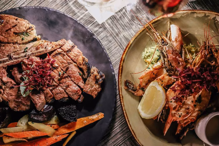 Taste the finer things, sampling the city's fine dining scene. (Image courtesy of The Four Seasons Hotel).