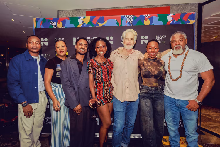 Members of the cast pose for the press. (Image courtesy of Natasha Mumba).
