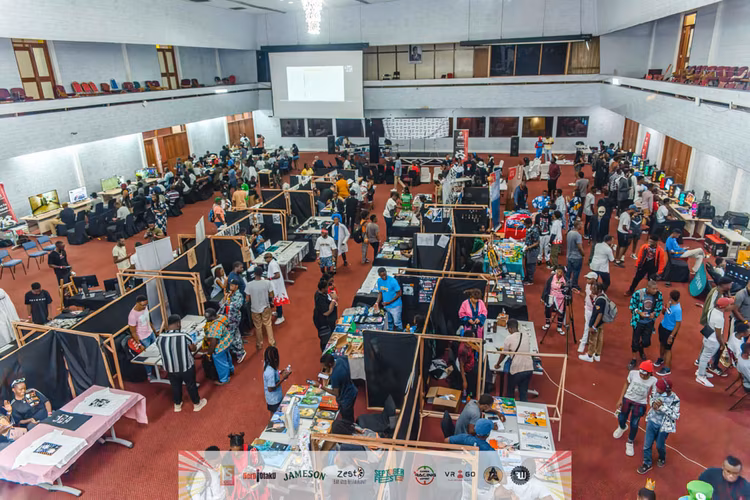 With eyes fixed on the screen and hands steady on the controller, this Zambian gamer embodies the fierce concentration driving a new wave of digital entrepreneurship. (Image courtesy of Nerd|Otaku).