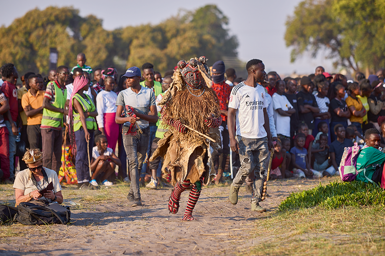 Sakashivi  maintains law  and order in  the main arena  and has his  own special  dance called  unyanga which  he occasionally  performs. (Image by Nkwazi/Justine Kunda).