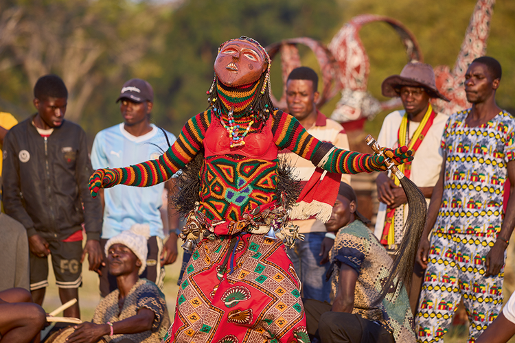 Likishi Lya  Mwana Pwevo.  Literally means  the spirit of a  teenage girl,  known for  his acrobatic  displays. (Image by Nkwazi/Justine Kunda).