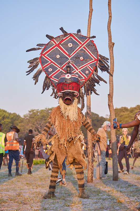 Mupala, a spirit that carries each initiate to chipungu (circumcisor) and draws attention away from the agonising screams of boys in the mukanda. (Image by Nkwazi/Justine Kunda).