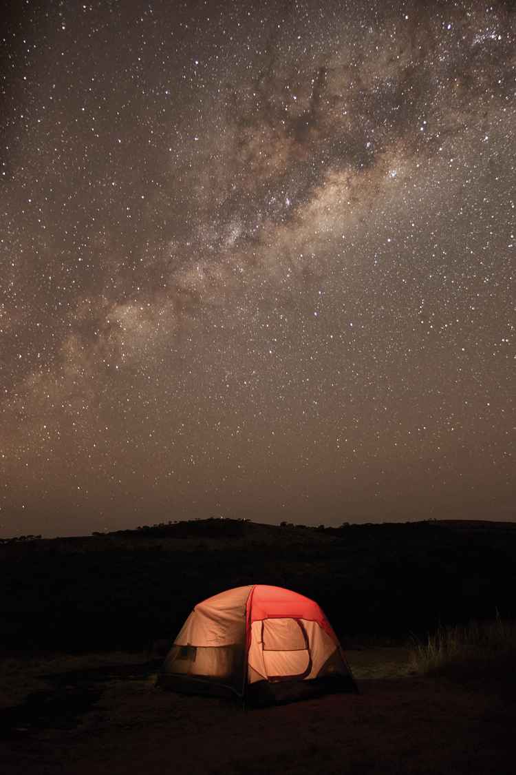 A tent pitched beneath the Milky Way at Nsaka campsite (Site 8), next to Camper’s Rock, (image by Nkwazi/Adriaan De La Rey).