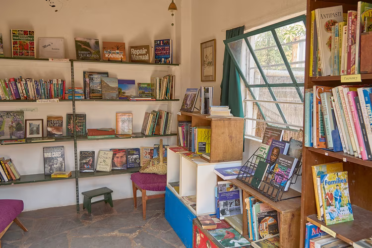 Housed in a little white building just off Leopards Hill Road, Mary’s Bookshop feels like a store one might encounter in a charming but sleepy English village. (Image by Justine Kunda for Nkwazi Magazine).
