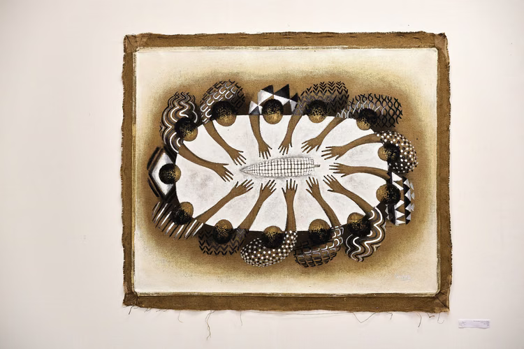 In ‘One Zambian  Family, One Bag 2’, Yombwe  reimagines the Last Supper to  explore scarcity and provision. (Image courtesy of Anthony Black).